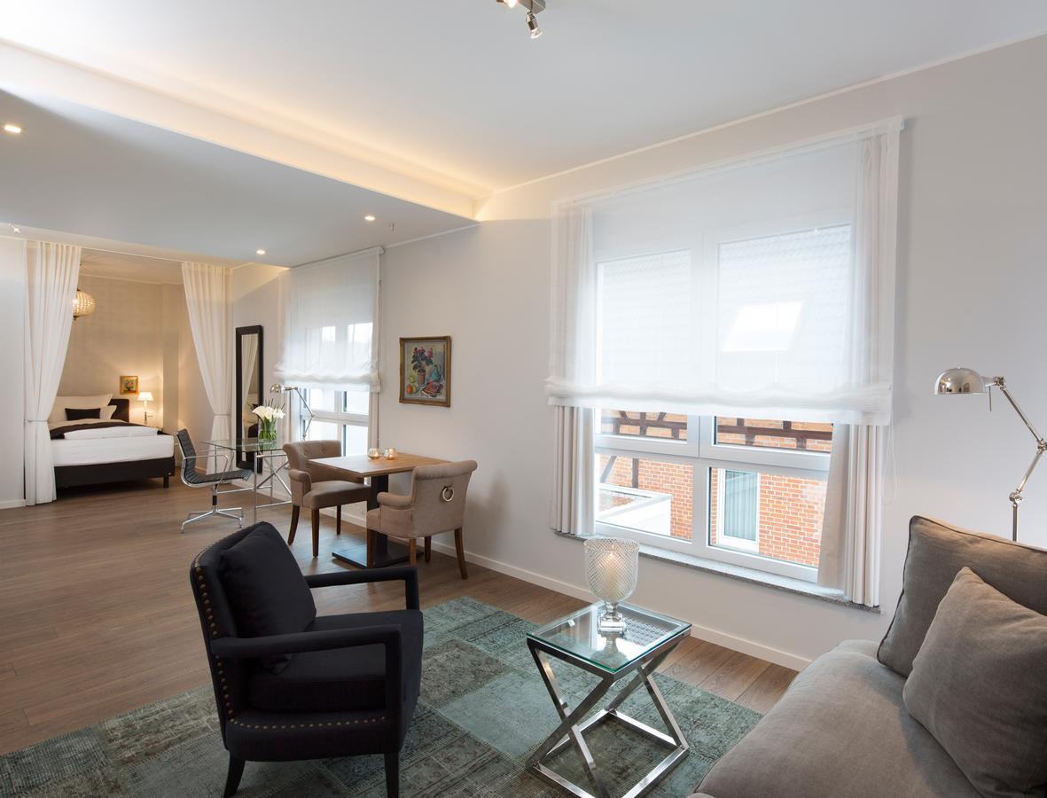 Logis First Class Business Suites Renningen Habitación foto